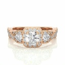 Round Cut Criss Cross 3 Stone Halo Diamond Engagement Ring In Rose Gold