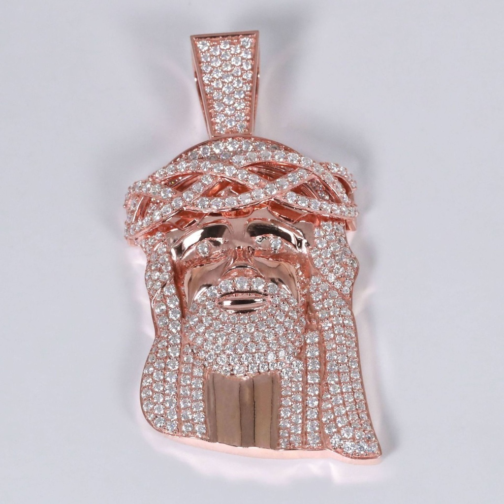 For a luxurious touch to your jewelry collection indulge in 14kt rose gold pendant adorned with lab created diamonds